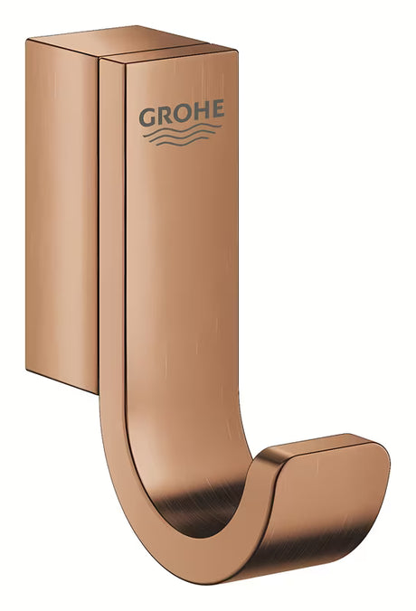 Metalowy haczyk łazienkowy Grohe Selection w wykończeniu Brushed Warm Sunset z ukrytym mocowaniem.