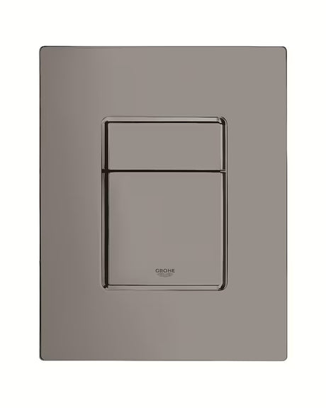 Przycisk spłukujący Grohe Skate Cosmopolitan w kolorze hard graphite pro do stelaży podtynkowych Grohe