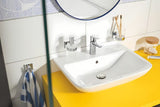 Metalowy haczyk Grohe Start Cube Accessories w wykończeniu chrom z ukrytym mocowaniem.
