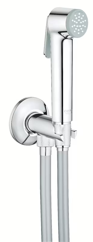 Chromowana prysznic bidetowy Grohe Tempesta-F Trigger Spray z przyciskiem uruchamiającym i wężem w zestawie.