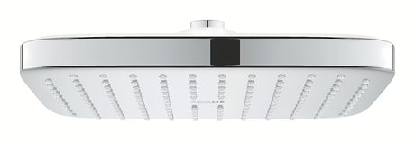Kwadratowa deszczownica  Grohe Vitalio Comfort 250 Cube w chromie ze strumieniem Rain i białą tylną osłoną.
