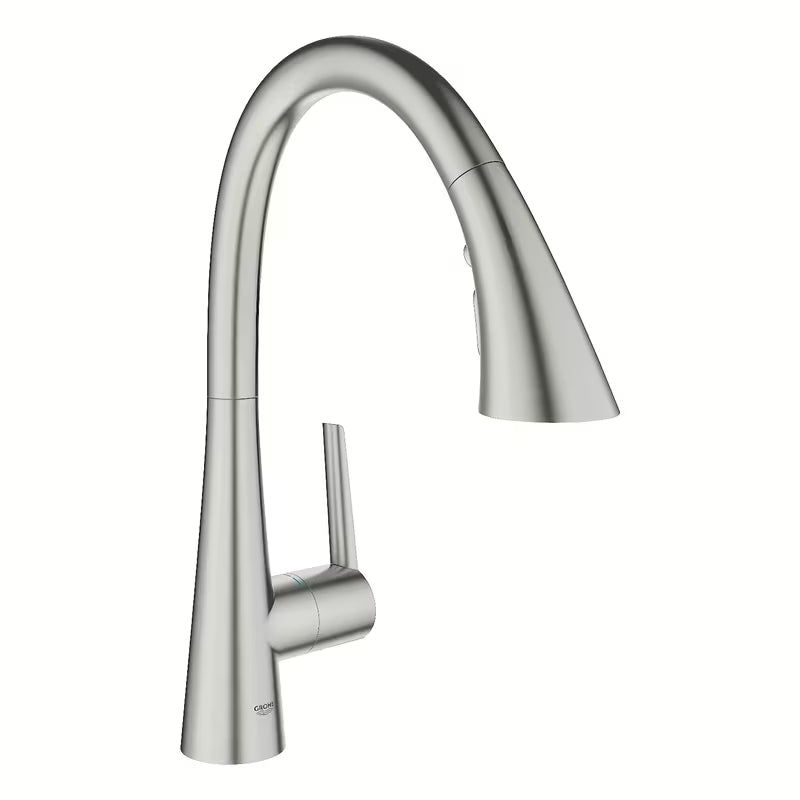 Bateria zlewozmywakowa Grohe Zedra w wykończeniu supersteel z wysoką wylewką C i wyciąganą wylewką prysznicową z trzema strumieniami.