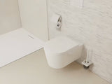 Ścienna SZCZOTKA do Wc hansgrohe addstoris w matowej bieli z uchwytem z metalu i ze szklanym pojemnikiem.