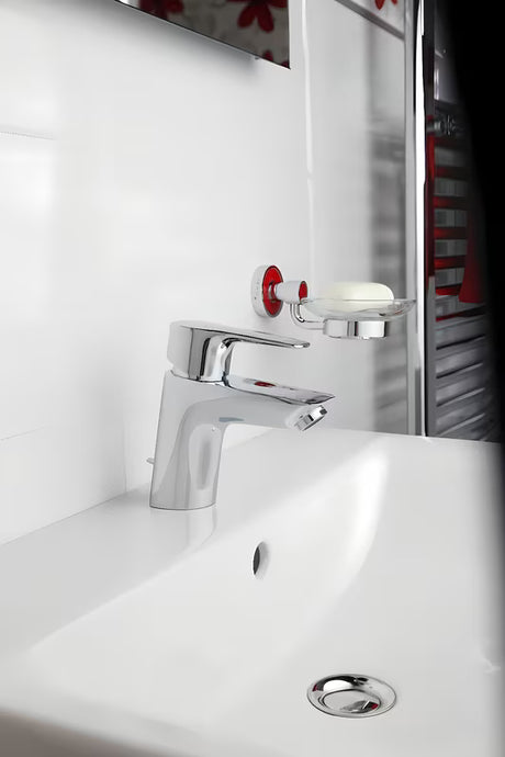 Chromowa jednouchwytowa stojąca bateria umywalkowa Hansgrohe HG248 z odpływem