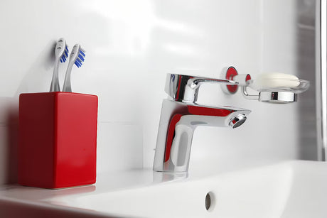 Chromowa jednouchwytowa stojąca bateria umywalkowa Hansgrohe HG248 z odpływem