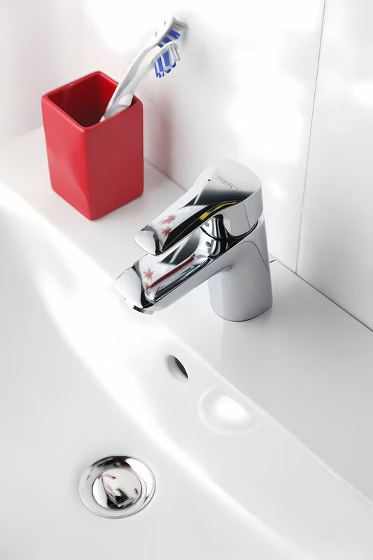 Chromowa jednouchwytowa stojąca bateria umywalkowa Hansgrohe HG248 z odpływem