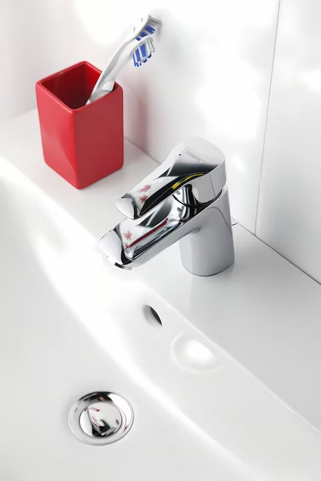 Chromowa jednouchwytowa stojąca bateria umywalkowa Hansgrohe HG248 z odpływem