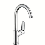 Chromowana bateria umywalkowa jednouchwytowa hansgrohe Logis 210 z obrotową wylewką i korkiem z cięgłem