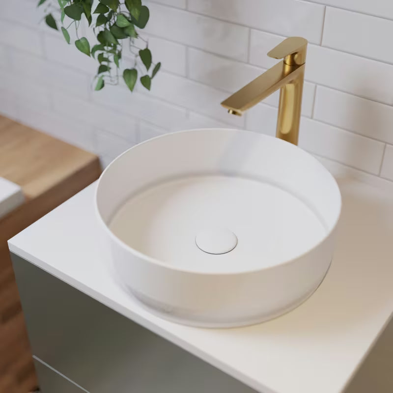 Wysoka bateria umywalkowa Hansgrohe Talis E w wykończeniu Cool Sunrise o wyglądzie polerowanego złota z odpływem
