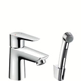 Chromowana jednouchwytowa bateria umywalkowa Hansgrohe Talis E z prysznicem bidetowym i korkiem Push-Open.