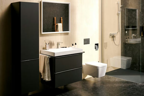 Chromowana jednouchwytowa bateria umywalkowa Hansgrohe Tecturis E z boczną dźwignią i korkiem