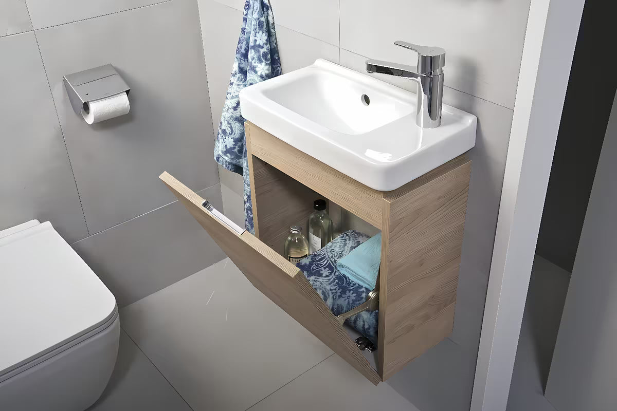 Wisząca szafka pod umywalkę Jika Cubito 45x24,1x48 cm w dekorze dębu z uchylnymi drzwiczkami