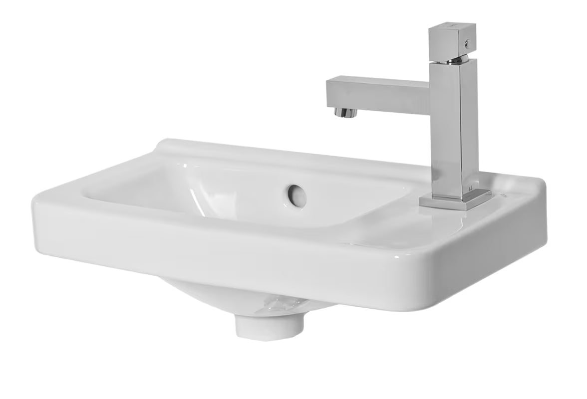 Biała asymetryczna ceramiczna mała umywalka Jika Cubito 45 x 25 cm z otworem pro baterię po prawej stronie