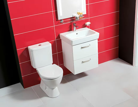 Biała wisząca szafka pod umywalkę Jika Lyra Plus Viva 54x41,6x55 cm z uchwytami ze szczotkowanego niklu.