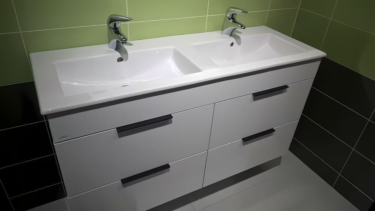 Biała wisząca szafka łazienkowa Jika Plan z ceramiczną umywalką podwójną i szufladami z pełnym wysuwem.