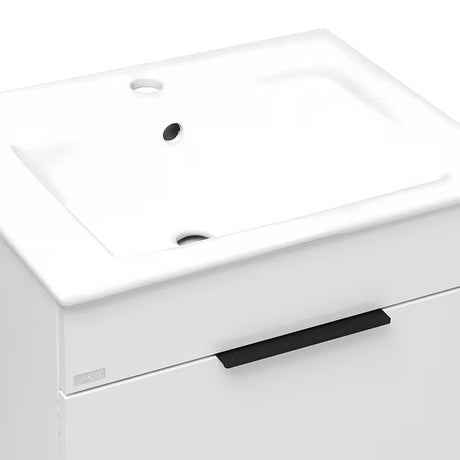 Biała szafka wisząca z umywalką ceramiczną Jika Plan z szufladami z pełnym wysuwem