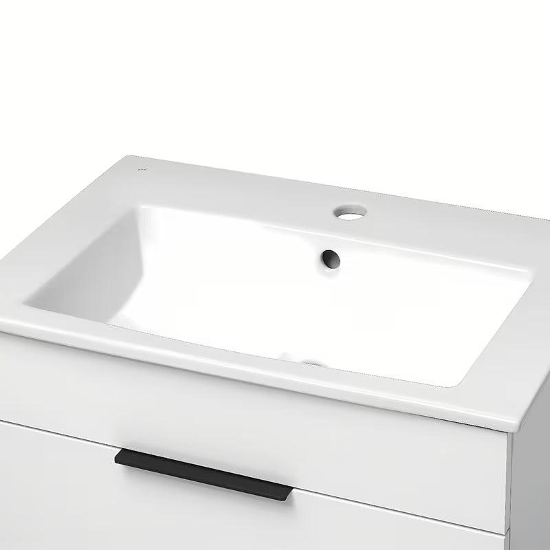 Biała szafka wisząca Jika Plan z umywalką ceramiczną i szufladami z pełnym wysuwem.