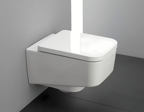 Biały miska WC wisząca Laufen Pro S w bezkołnierzowym wykonaniu bez układu spłukującego i o kwadratowym designie.