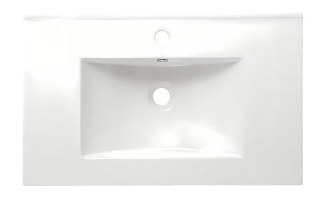Biała ceramiczna umywalka meblowa Naturel Modena 61x46 cm z półką odkładczą i otworem pro na baterię pośrodku.