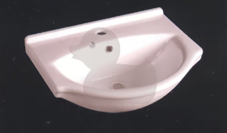 Biała ceramiczna umywalka meblowa Naturel Pro 52 x 41 cm z otworem pro na baterię pośrodku.