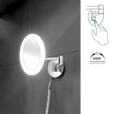 LED lusterko kosmetyczne Nimco w wykończeniu chrom z 5× powiększeniem i dotykowym podświetlanym włącznikiem.