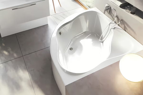 Wanna narożna Ravak Newday 150x150 cm z akrylu lanego ze zintegrowanym siedziskiem