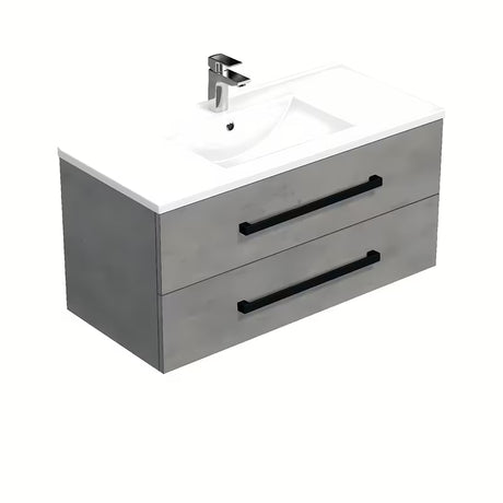 Wisząca szafka łazienkowa SAT Cube Way z umywalką ceramiczną w dekorze imitacji betonu i czarnymi uchwytami.