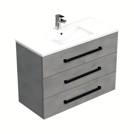 Wisząca szafka łazienkowa SAT Cube Way z umywalką ceramiczną w dekorze imitacji betonu i czarnymi uchwytami.