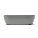 Matowobiałe ceramiczne umywalka nablatowa  SAT Infinitio bez przelewu o wymiarach 45,5x32,5 cm.