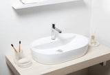 Biała ceramiczna owalna umywalka nablatowa  SAT Infinitio 60 x 40 cm bez przelewu z otworem pro baterię