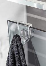 Transparentna haczyk SAT Walk-In pro do zawieszenia na szklanej krawędzi parawanu prysznicowego bez wiercenia.