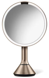 Lusterko kosmetyczne Simplehuman Dual Touch w kolorze rose gold z oświetleniem LED Tru-lux i dotykową regulacją jasności.