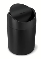 Czarny nablatowy kosz na śmieci Simplehuman Mini z uchylną pokrywą i pojemnością 1,5 l.