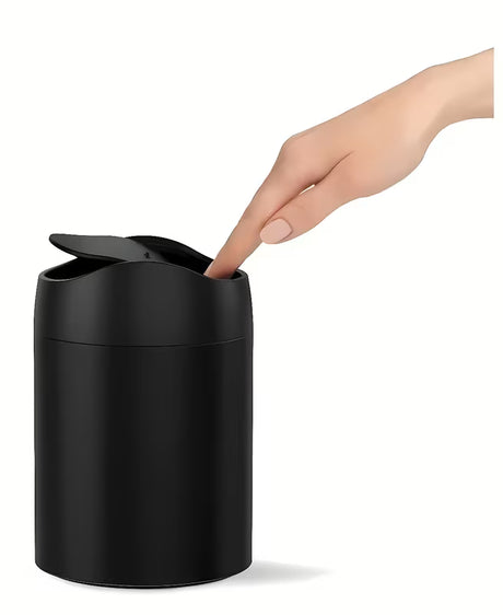 Czarny nablatowy kosz na śmieci Simplehuman Mini z uchylną pokrywą i pojemnością 1,5 l.