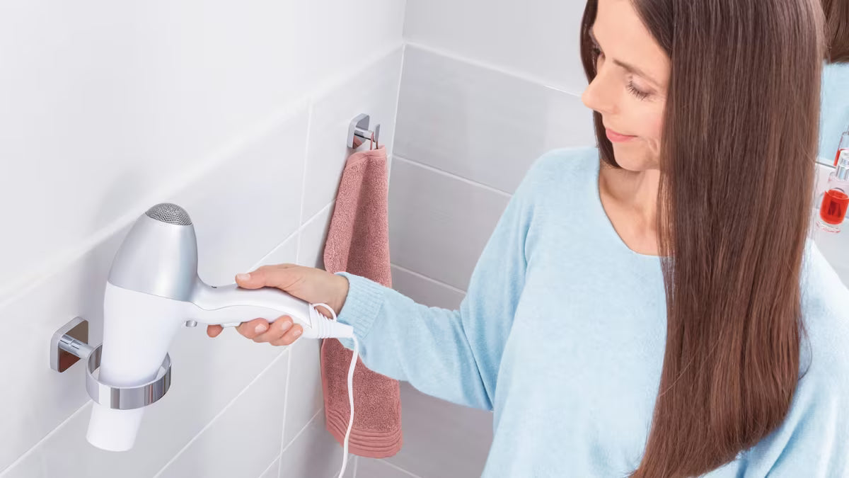 Chromowany ścienny uchwyt na suszarkę Tesa Elegaant z montażem bez wiercenia Power.Kit