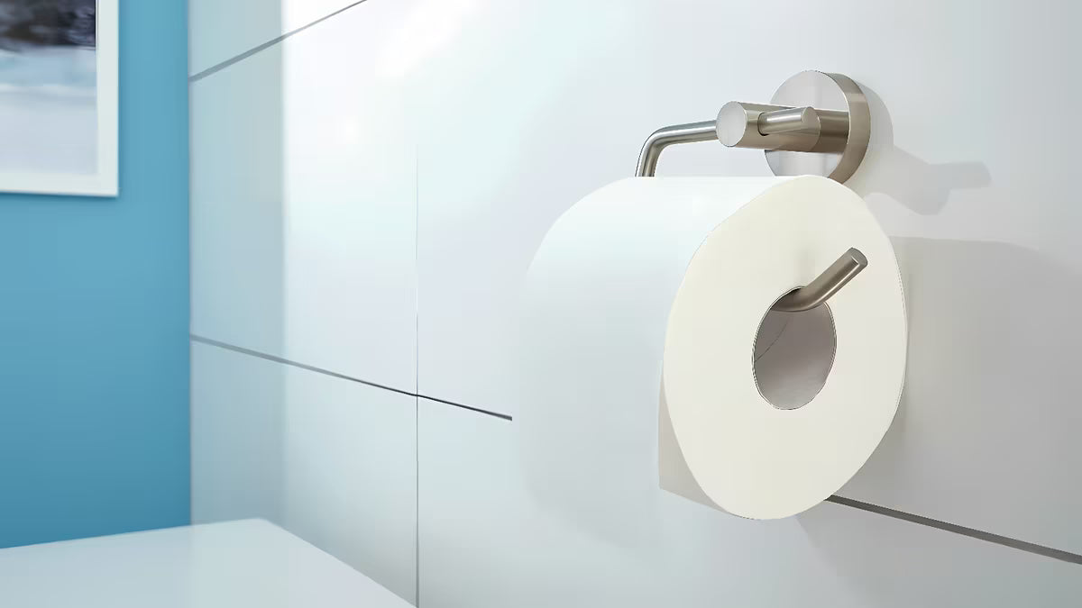 Samoprzylepny uchwyt na papier toaletowy Tesa Moon ze stali szczotkowanej o okrągłym wzornictwie