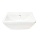 Biała ceramiczna umywalka wiszące vitra Integra 55x45 cm z otworem na baterię pośrodku i przelewem.