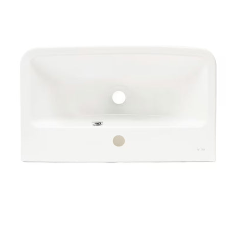 Biała umywalka wisząca Vitra Integra 60x36 cm, ceramiczna, z otworem pro na baterię pośrodku i z przelewem.