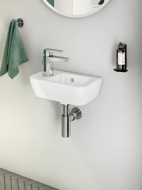 Biała ceramiczna mała umywalka Vitra Integra 37x22 cm z otworem na baterię po lewej stronie, w połysku