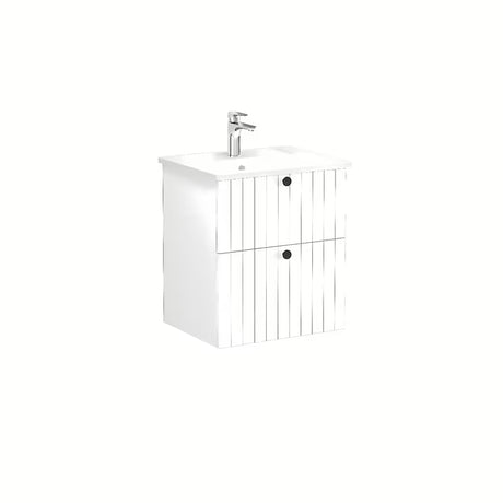 Wisząca szafka łazienkowa z umywalką ceramiczną Vitra Root Groove w matowej bieli z czarnymi uchwytami.